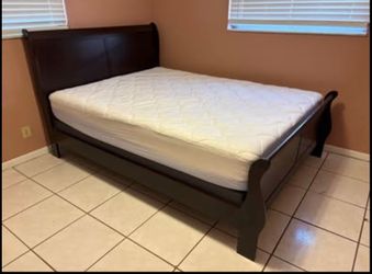 Queen bed frame , mattress, and box spring