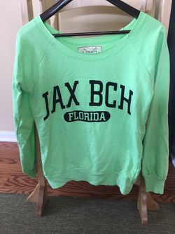 Lagaci brand neon green sweatshirt says Jax Beach Florida on it size S