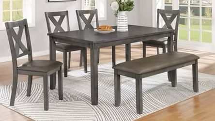 Brand New Gray Dining Set with the bench included!