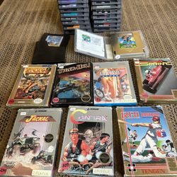 Nintendo NES games (26) and Hyperkin Retron 5 system with 2 nes controllers