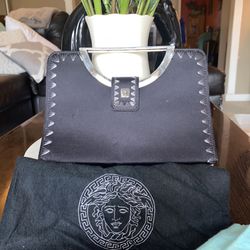 Versace Clutch Bag From the Flagship Store In Italy. Vintage.  Still Has Dust bag. Very Well Taken Care Of. 
