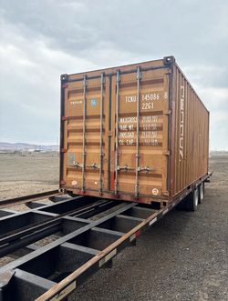 Brown 20' Standard Shipping Container — Used, Weather-Tight, Delivery Available