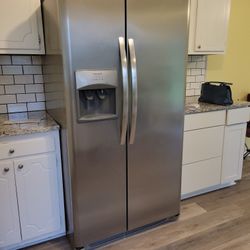 Frigidaire 2 Sided Refrigerator With Water And  Ice Dispenser 