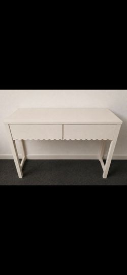 White console table in good condition.
