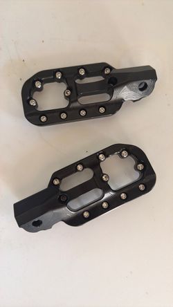 Prickly foot pegs. Brand new