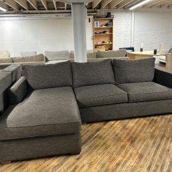 Delivery available Crate and barrel dark gray sectional couch w pull out bed