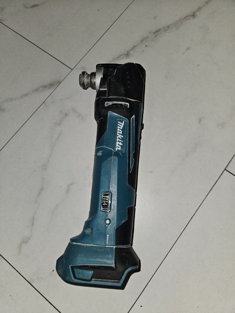 Makita multi Purpose Tool Battery And charger