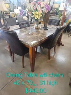 Marble Top Dining Table with 6 Chairs We are located at 2811 East Bell road. Another Time Around Furniture.