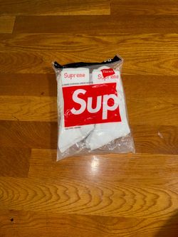 4 pair of white supreme socks
