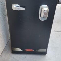 Mini Fridge/ Freezer  With Canister Inside Of Door And Drink Spout On Outside The Door Nice