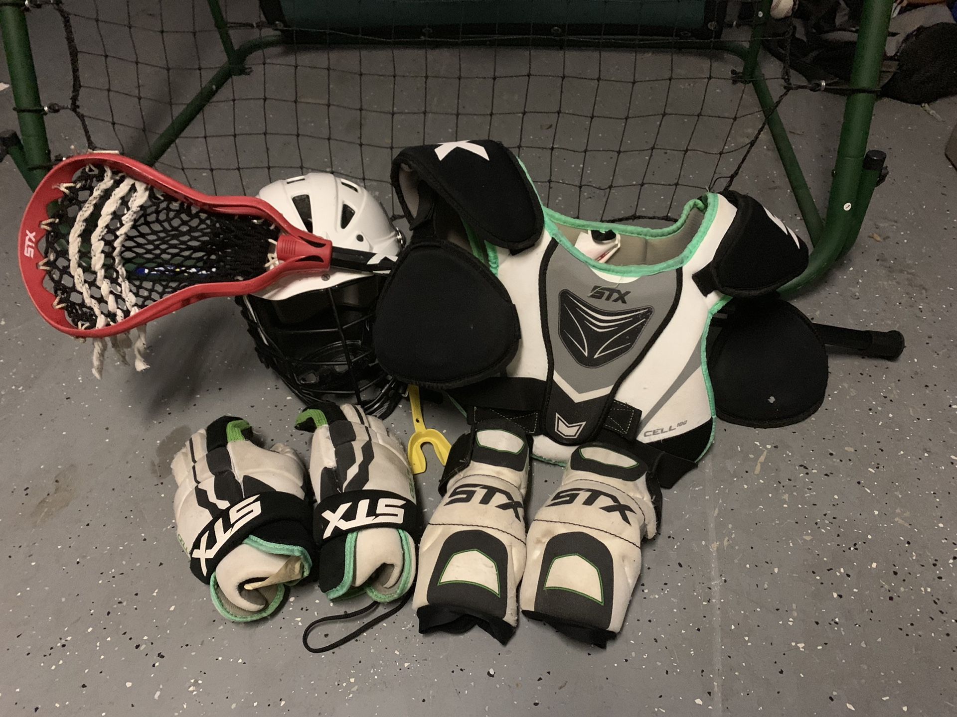 Full set of youth lacrosse gear. Cascade helmet and STX pads. $240 new ...