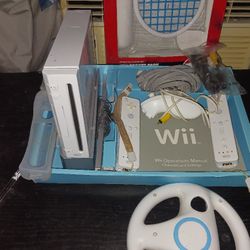 Nintendo Wii Console Bundle, with 2 Controllers, Steering Wheel, And Wii Sports Pack