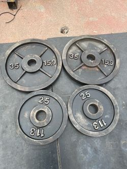 Olympic weights  2-30 and 25lb total 🟰 120lbs