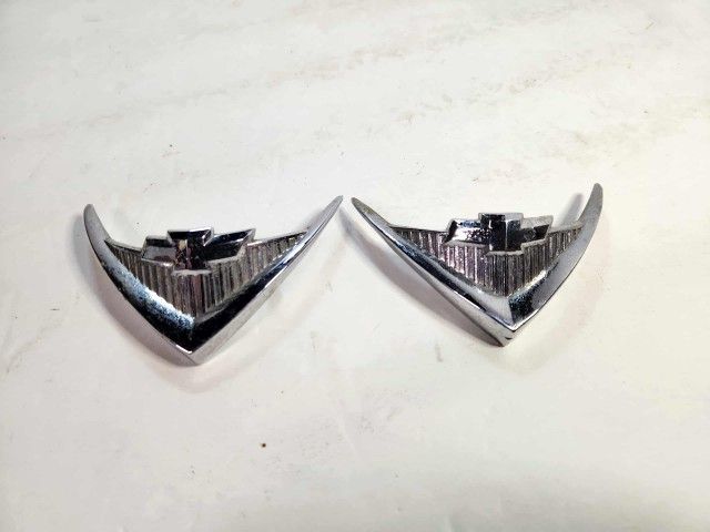 Lot of 2 Chevrolet Tail Light Emblem Left & Right 1955? 1956? Bel Air Nomad OEM