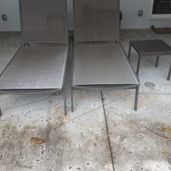 Two Lounges And Table