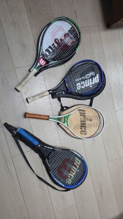 4 tennis rackets, cases and stand