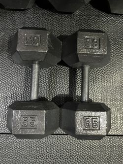 65 pound pair cast iron hex Dumbbells
