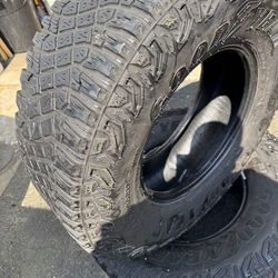 Two 315/70R17 Goodyear Territory MT tires with good tread