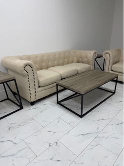 Sofa and loveseat! Chesterfield style with coffee table set. $250