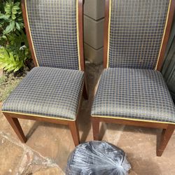 2 dining room chairs upholstery fabric Thai by Jim Thompson . Price is each  Custom made in Singapore. Extra fabric . Pet free smoke free home. Origin