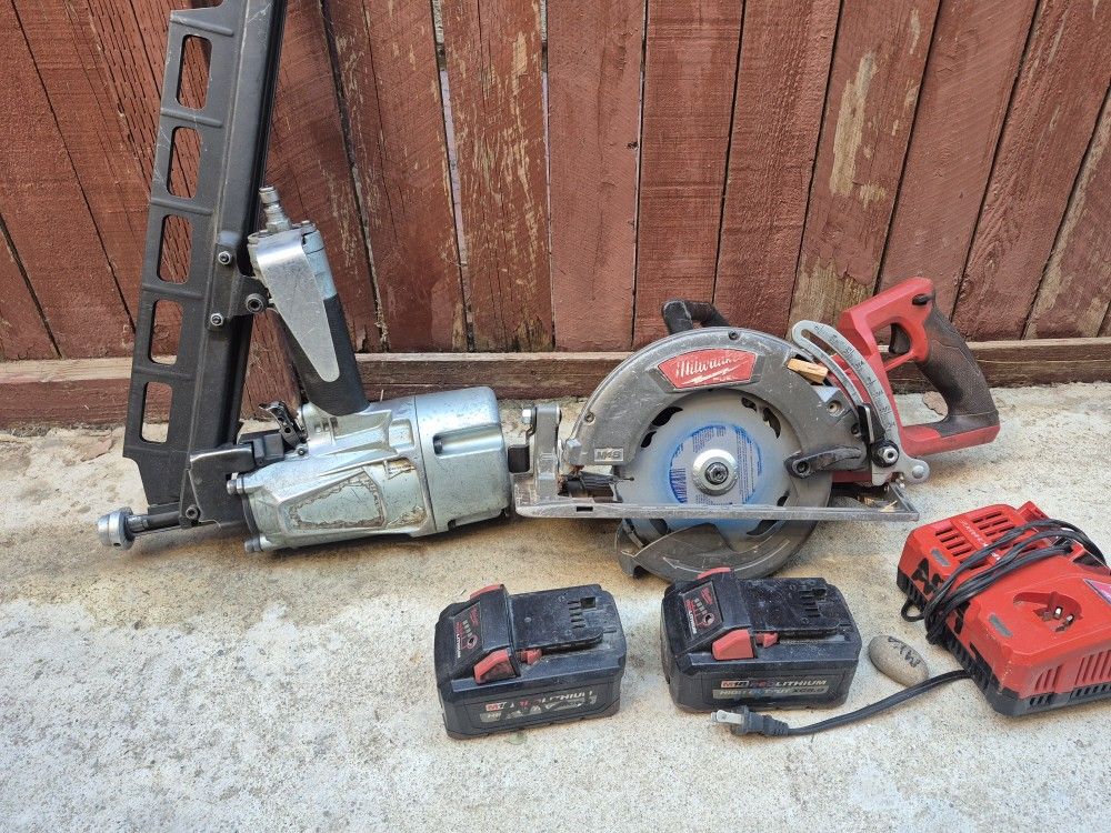 Hitachi 3/1/4 Framing Gun And A Milwaukee 7/1/4 Cordless Hand Saw With Two Batterys And A Charger.