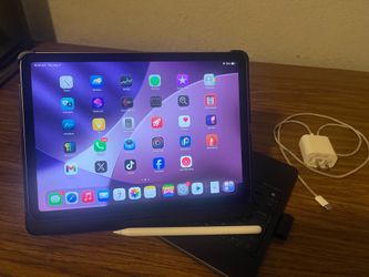 iPad with Apple Pencil and keyboard
