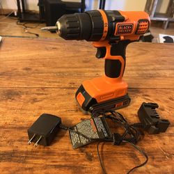 Power Drill and Bag of Tools