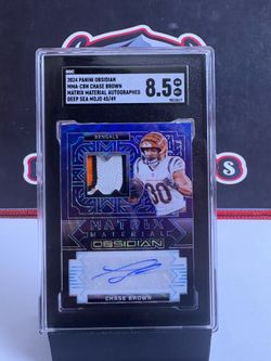 2024 Panini Obsidian #MMA-CBN Chase Brown Matrix Material Autographed Deep Sea MOJO 45/49