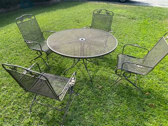 VINTAGE - WROUGHT IRON PATIO SET WITH TABLE AND 4 ROCKER CHAIRS