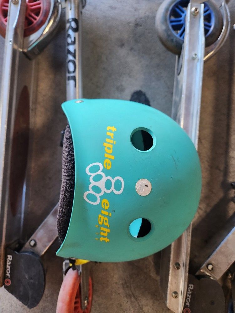 2 Razor Scooters With Larger Wheels And Helmet Included