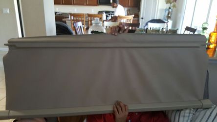 Trunk cover for a 2010 Ford Escape