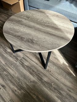 Pale brown round coffee table