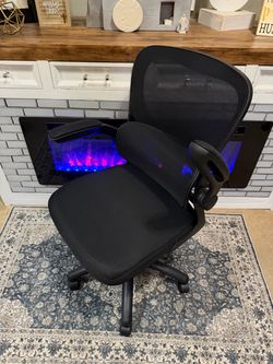 Black mesh ergonomic office chair