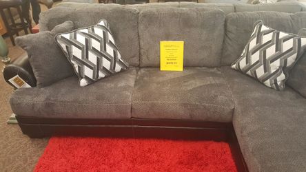 2 tone sectional with accent pillows gray and black