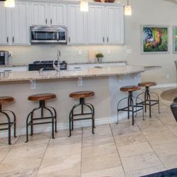 5 World Market Round Wood and Metal Adjustable Swivel Stool - $350