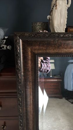 Mirror with wood frame