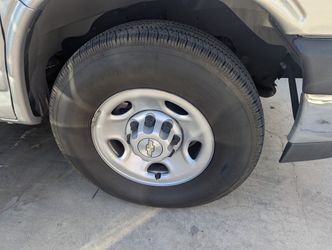 LT245-75-16 Bridgestone V-Steel 10 Ply Tires, Only 5000 Miles, With Factory 6 Lug Wheels, Center Caps And Lug nuts. No Patches, Like Brand New.