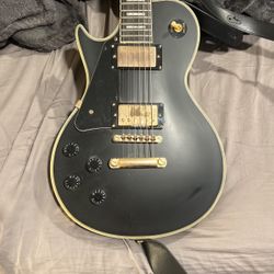 Left Handed Electric Sawtooth Guitar  Brass And Pearl Picking Plates  