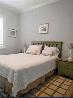 Queen bed and bedside tables
