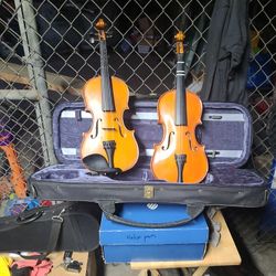 two violins 3/4 size no bows just violin with case 