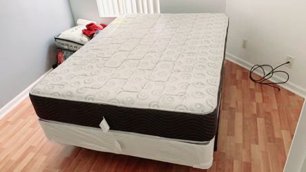 New queen mattress and box  spring 2 pc bed frame is not included