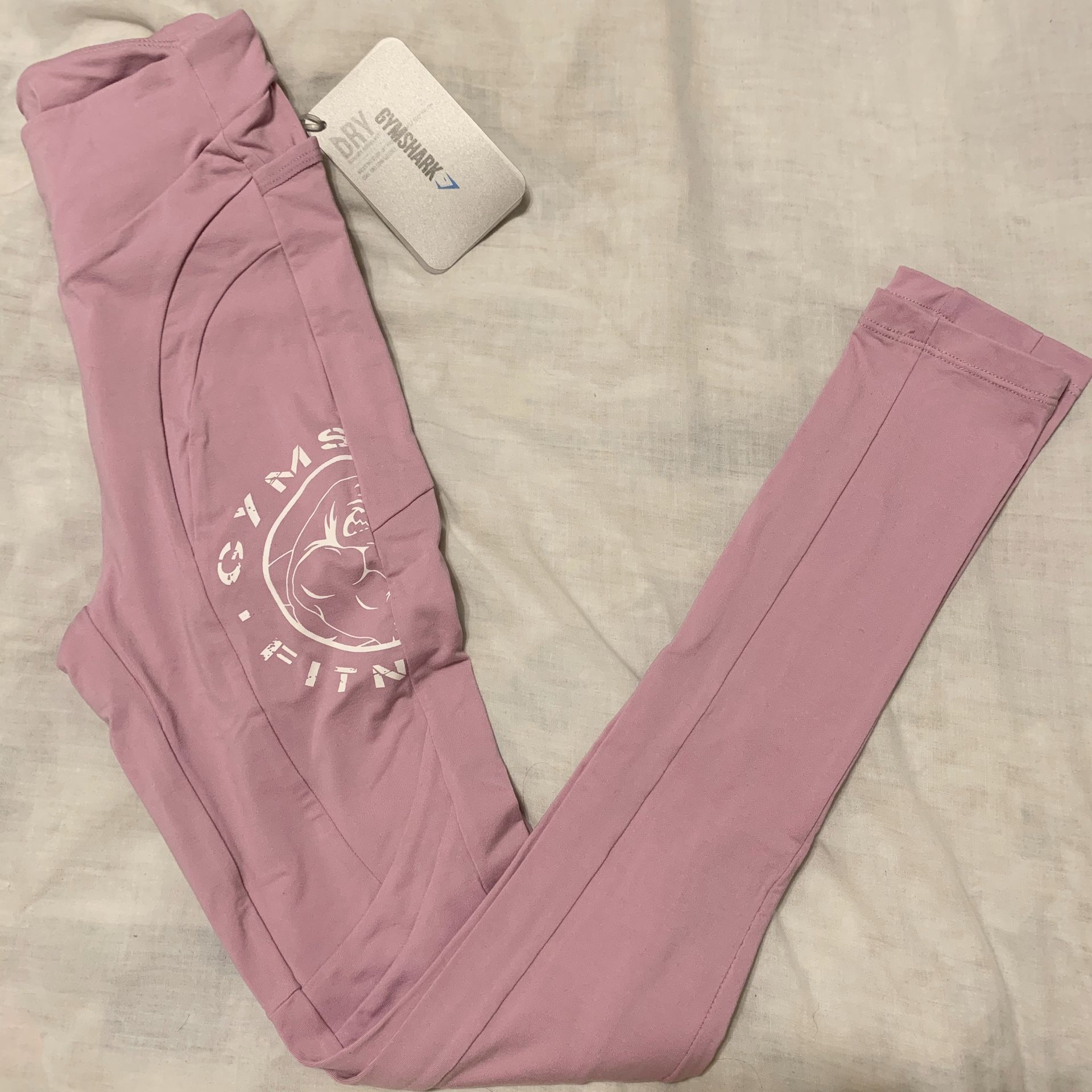 Gymshark athletic pants with original tags attached