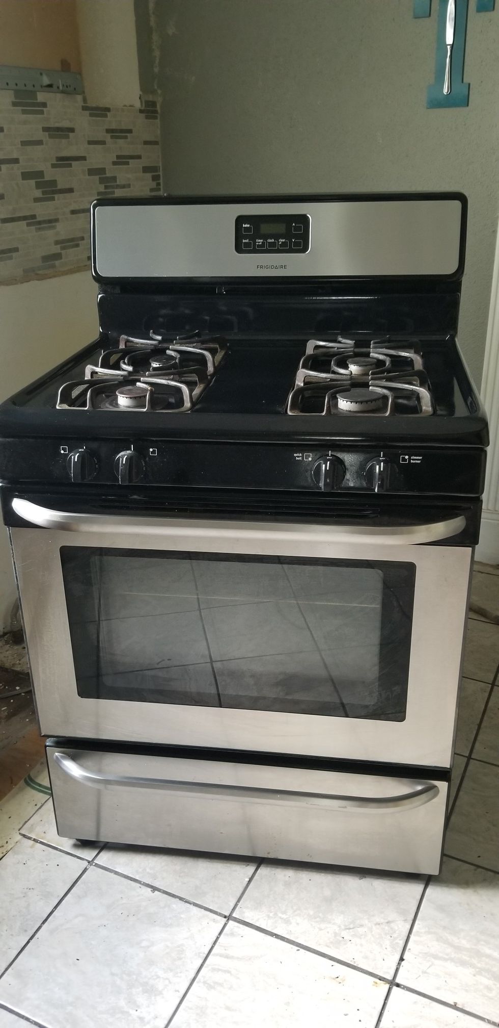 GAS STOVE, MICROWAVE AND DISHWASHER