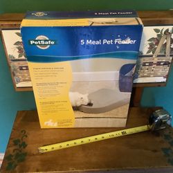 Pet Safe brand new never opened 5 Meal Pet Feeder.  Automatic pet feeder designed to dispense up to 5 daily meals. Suitable for both dogs and cats. Ha