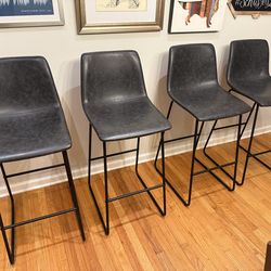 Dark gray leather bar stools