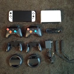 NINTENDO SWITCH OLED BUNDLE with Over 100 GAMES and Extra Controllers