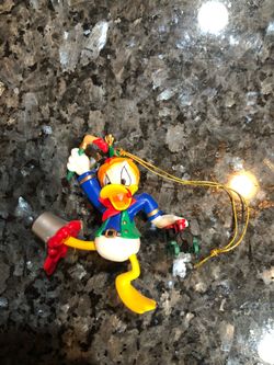 Disney Donald Duck Christmas ornament.  Size3 inches tall. Brand New Never Used.  Has been on display in a cabinet with a Disney Donald Duck collectio