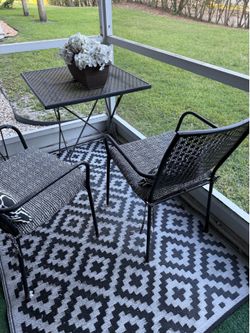 Outdoor patio furniture and rug
