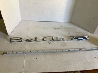 Chevrolet Bel Air script emblem bade minor pitting, no other issues for rear quarter panel or display