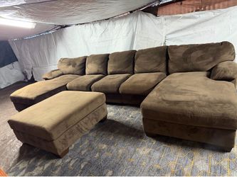 Brown couch with two chases and ottoman delivery $40 local we sell all the time